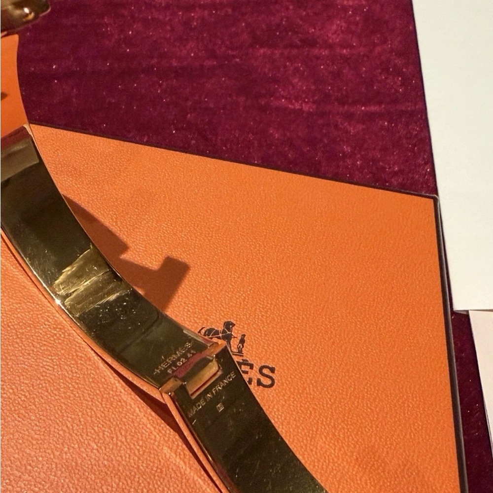Hermès Orange and Gold clic clac bracelet - Picture 2 of 5